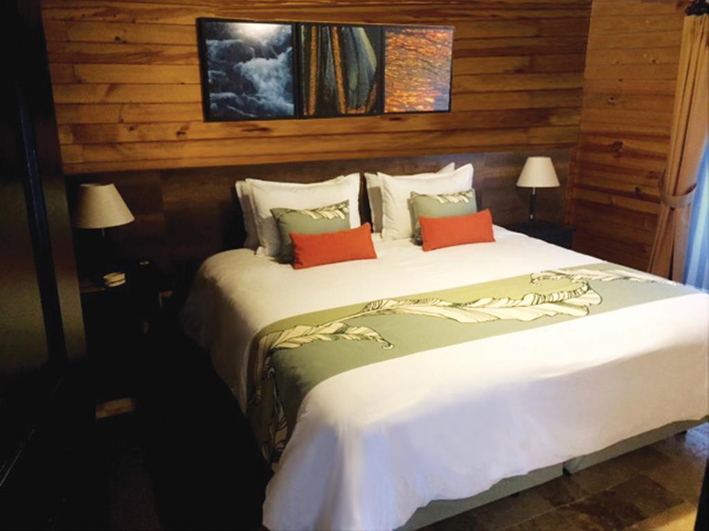 Termas De ปาปาญัคตา ภายนอก รูปภาพ A bedroom at the lodge